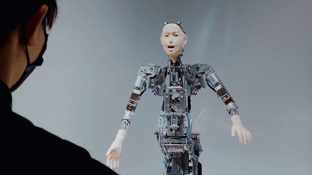 【Gemini】2025.12.17リリース！Gemini 3 Flashがデフォルトに - a woman looking at a robot in the air